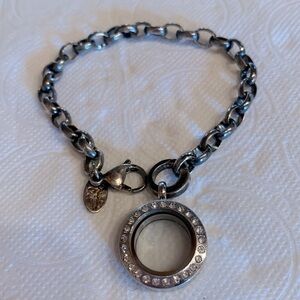 Origami Owl Charm Bracelet with hinge closure.